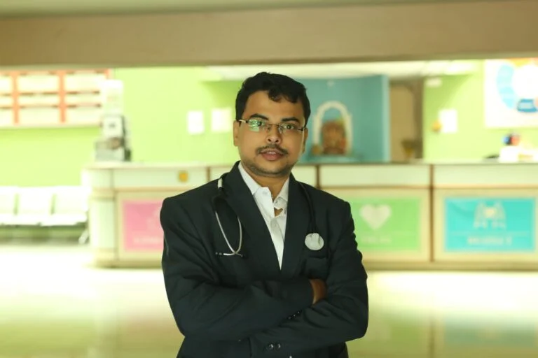 Doctors discussing care in a hospital corridor